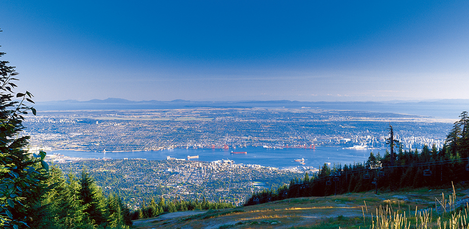 Summer view of Vancouver from the Cut at the top of Grouse Mountain