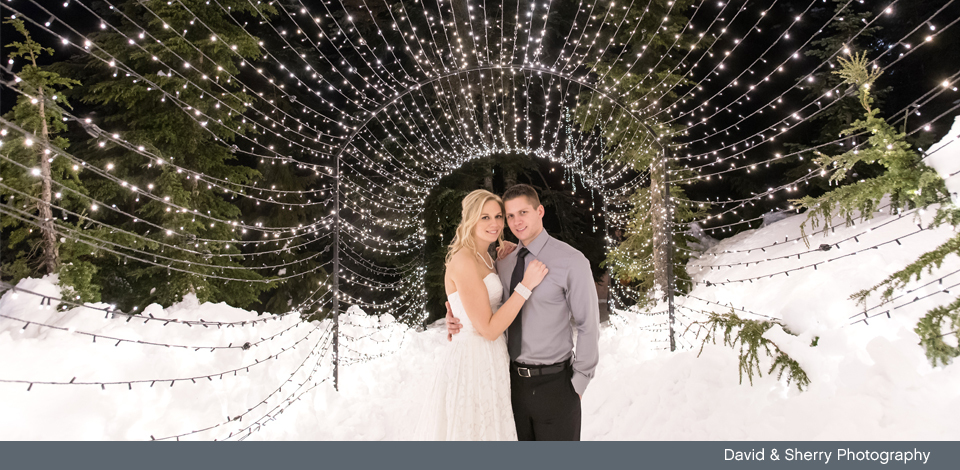 Wedding couple in the Light Walk in the winter snow
