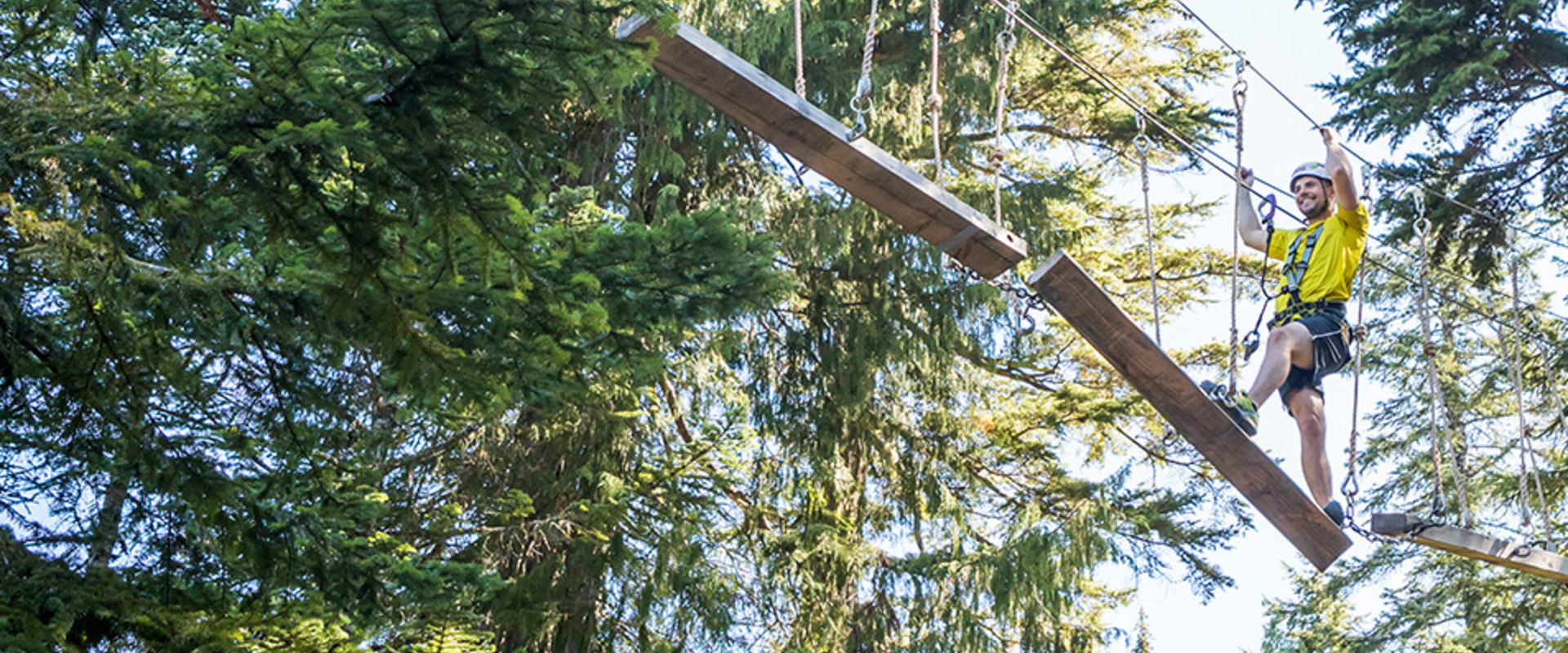 Man on Mountain Ropes Adventure course at Grouse Mountain